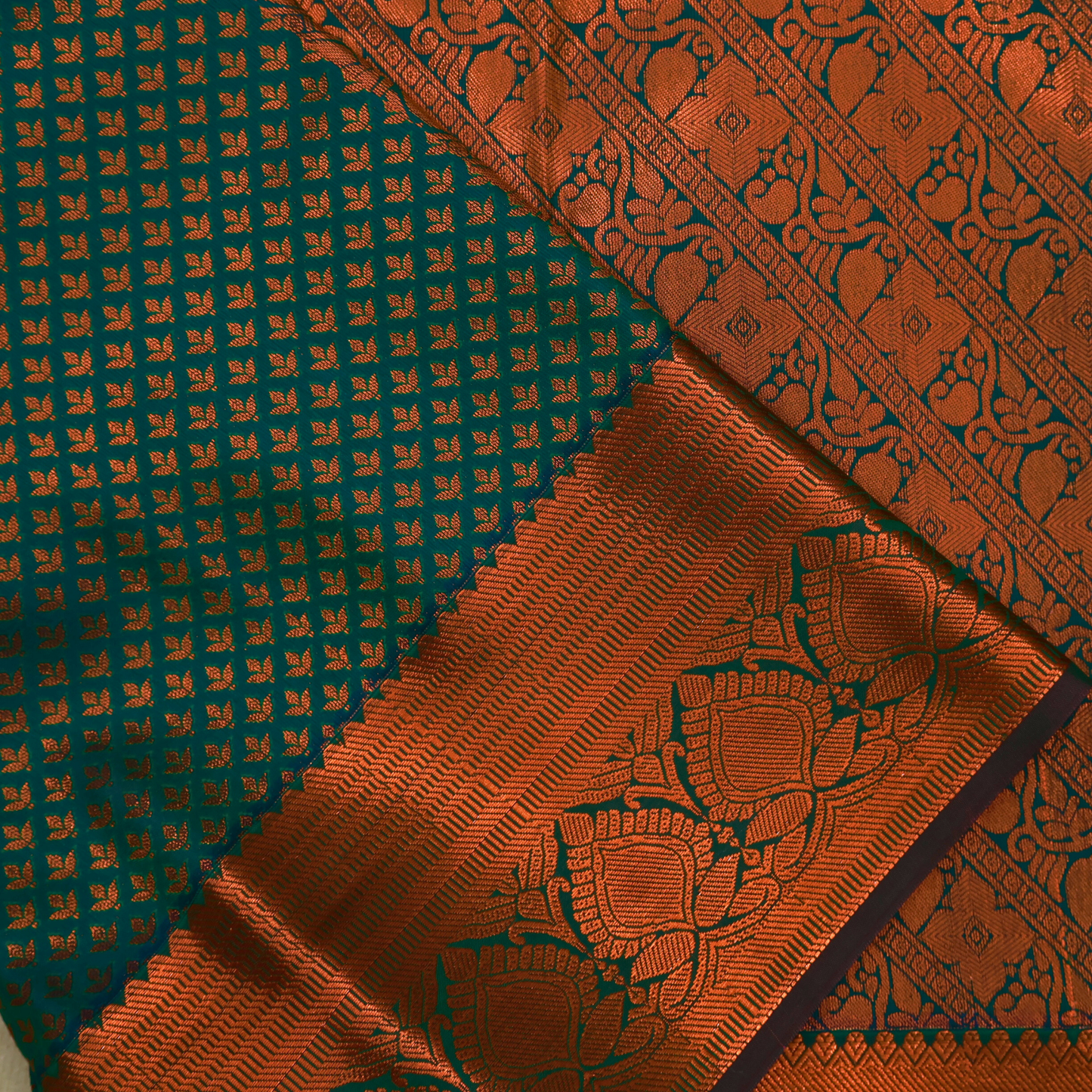 Green Kanchipuram Silk Saree with Copper Zari Border and Contrasting Copper Blouse BS024