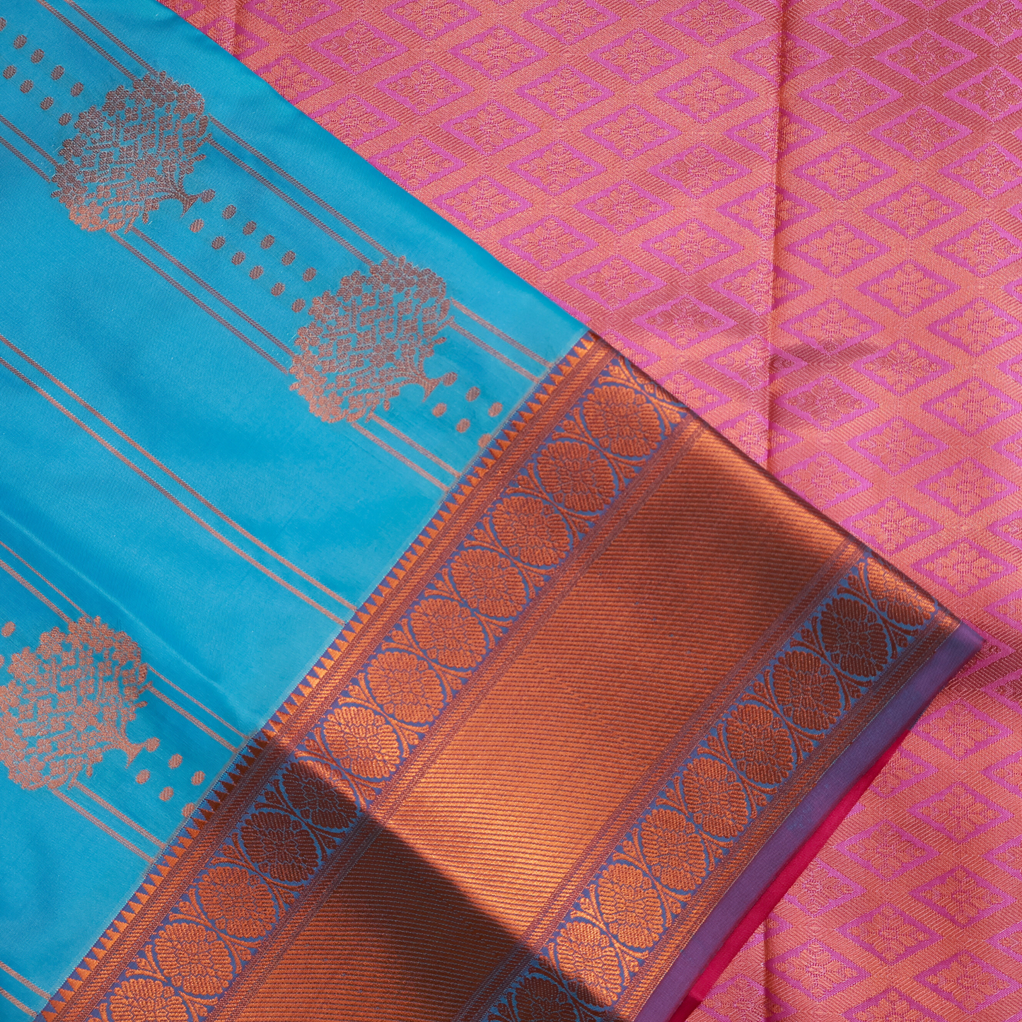 Blue Handloom Saree with Vibrant Pink Pallu and Copper Zari Border SB012